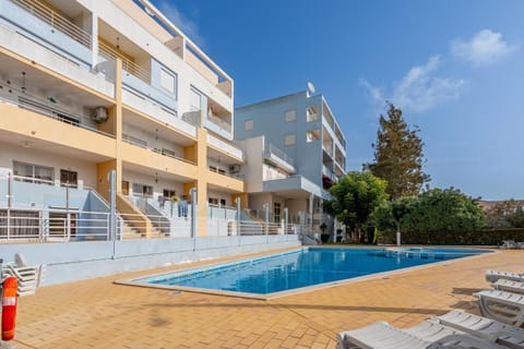 Property building, Living room, Swimming pool