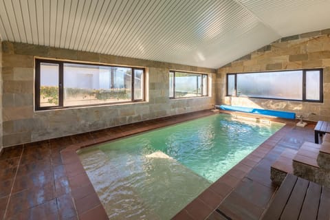 Property building, Living room, Swimming pool
