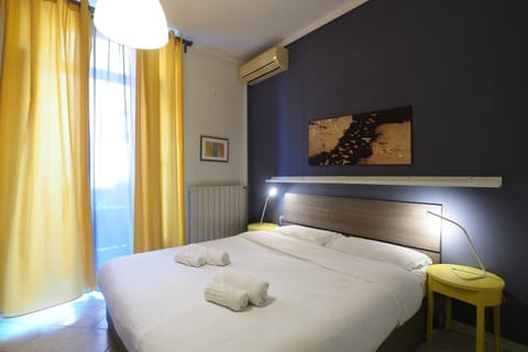 Bed, Photo of the whole room, Bedroom, towels, air conditioner