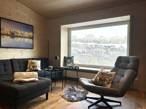 Living room, Seating area, Mountain view