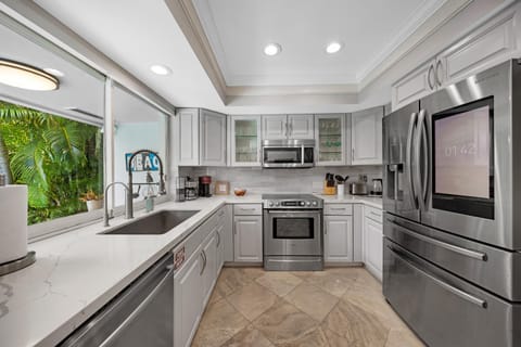 Kitchen or kitchenette, dishwasher, oven, stove, toaster