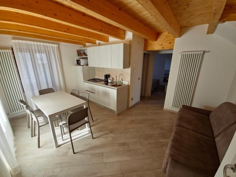 Kitchen or kitchenette, Living room, Seating area, Dining area