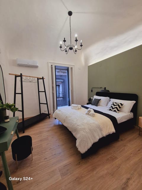 Bed, Photo of the whole room, Bedroom, towels, air conditioner