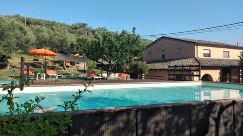 Property building, Day, Pool view, Swimming pool, sunbed