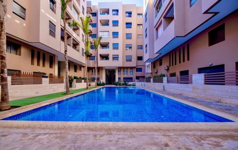 Property building, Day, Pool view, Swimming pool