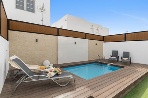 Property building, Living room, Swimming pool