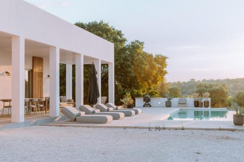Patio, Day, Natural landscape, Pool view, Swimming pool, sunbed