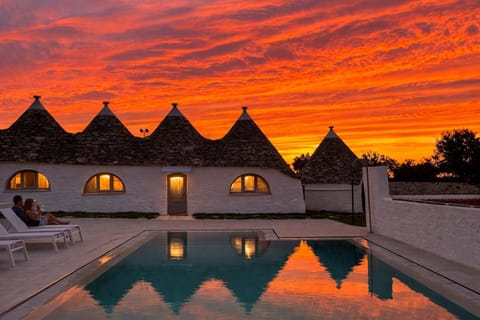 Property building, Patio, Day, Garden, View (from property/room), Bedroom, Pool view, Area and facilities, Swimming pool, Swimming pool, Sunset