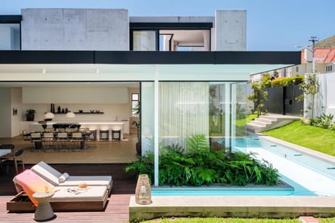 Property building, Garden, Seating area, Swimming pool, sunbed