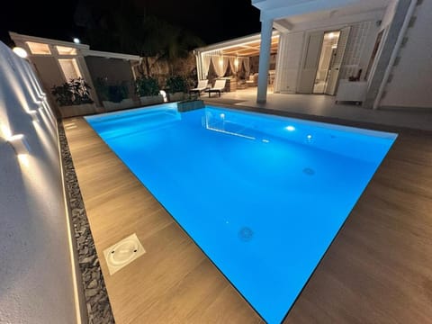 Property building, Living room, Swimming pool