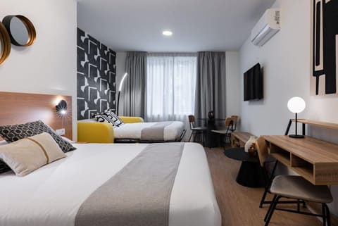 Bed, TV and multimedia, Living room, Seating area, Bedroom, air conditioner