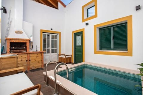 Property building, Living room, Swimming pool