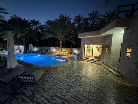 Patio, Night, Natural landscape, Pool view, Swimming pool, sunbed