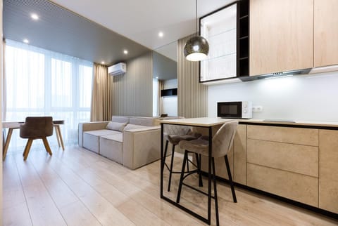 Kitchen or kitchenette, Living room, Seating area, Dining area