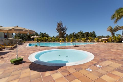 Property building, Living room, Swimming pool