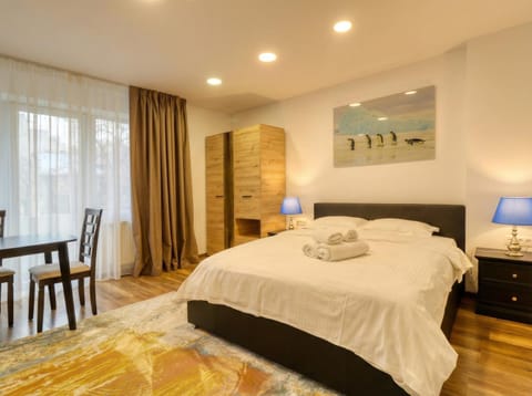 Bed, TV and multimedia, Seating area, Bedroom, heating, air conditioner