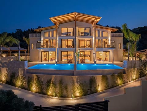 Property building, Patio, Night, Garden, Garden view, Pool view, Swimming pool