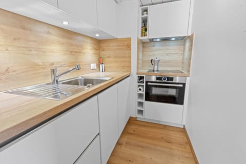 Kitchen or kitchenette, oven, stove