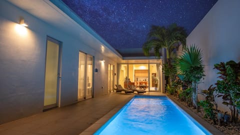 Property building, Patio, Pool view, Swimming pool, sunbed