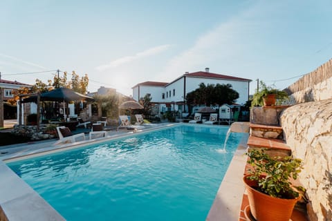 Property building, Pool view, Swimming pool, sunbed