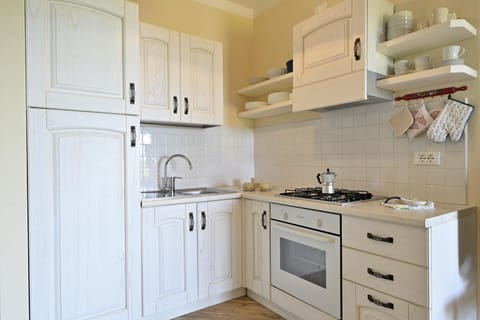 Kitchen or kitchenette, stove