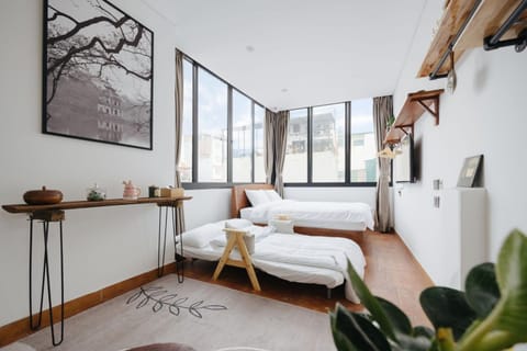 Bed, Photo of the whole room, Bedroom, hair dryier, towels, air conditioner