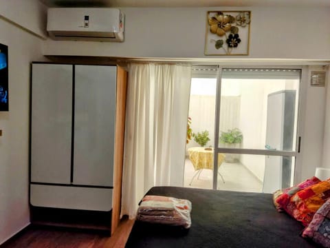 Bed, Photo of the whole room, wardrobe, air conditioner