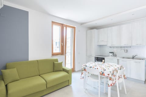 Bed, Kitchen or kitchenette, Living room, Seating area, Dining area, dishwasher, microwave, stove, air conditioner