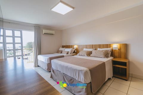 Bed, Photo of the whole room, towels, air conditioner