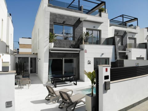 Property building, Patio, Facade/entrance, Day, View (from property/room), Balcony/Terrace, Dining area, sunbed