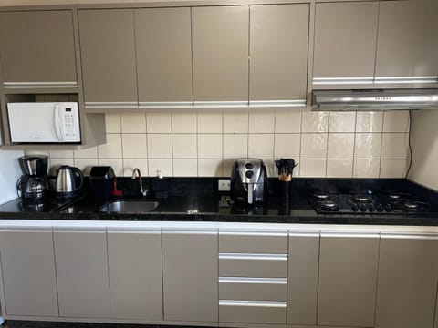 Coffee/tea facilities, Kitchen or kitchenette, minibar, stove