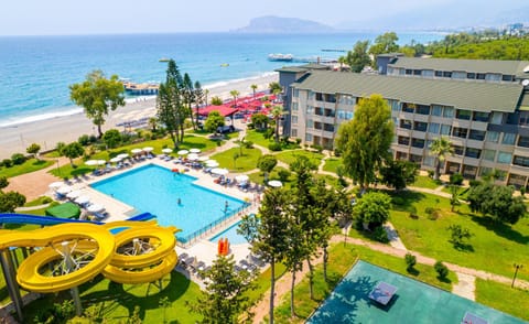 Property building, Natural landscape, Beach, Swimming pool
