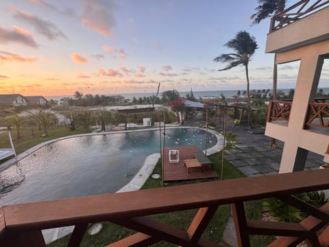 Property building, Patio, Day, Natural landscape, View (from property/room), Balcony/Terrace, Pool view, Sea view, Swimming pool, Sunrise, Sunset