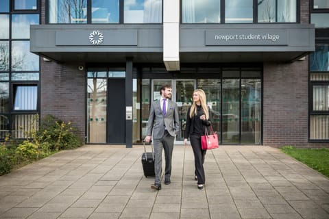 Facade/entrance, Property logo or sign, Guests, group of guests