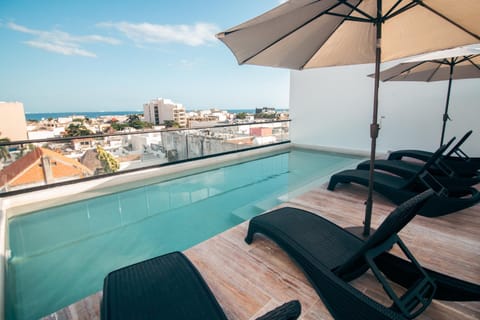 Off site, Day, Solarium, Swimming pool, sunbed