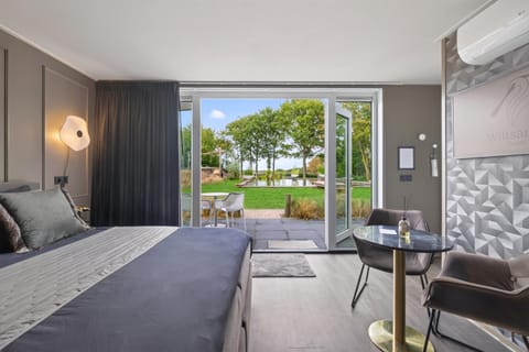 View (from property/room), Balcony/Terrace, Seating area, Bedroom, air conditioner