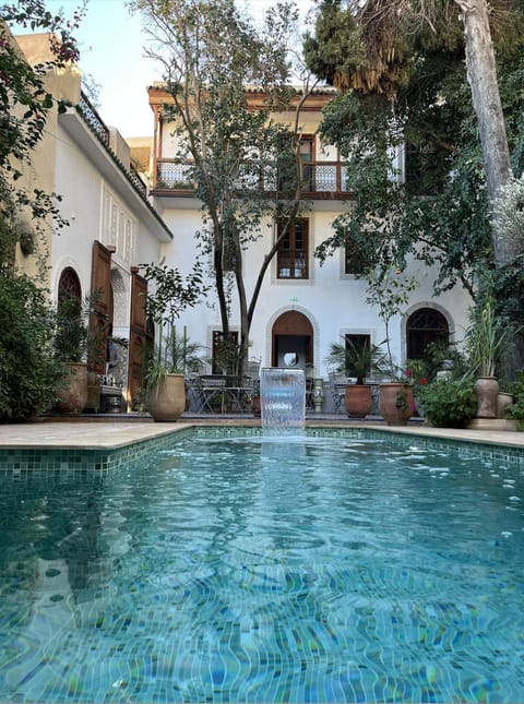 Property building, Patio, Day, Garden, Pool view, Swimming pool