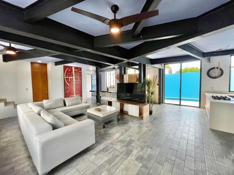 Living room, Seating area, Pool view