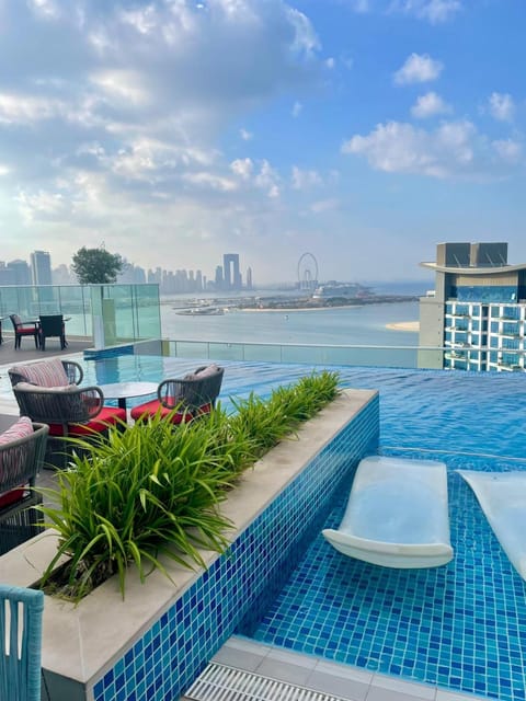View (from property/room), Pool view, Sea view, Swimming pool, sunbed