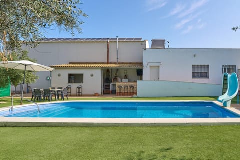 Property building, Living room, Swimming pool