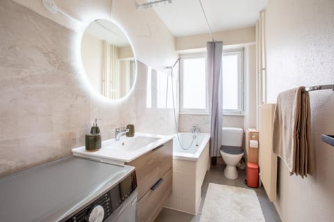 Toilet, Bathroom, towels, washing machine