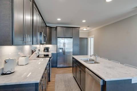 Kitchen or kitchenette, dishwasher, oven, stove, toaster