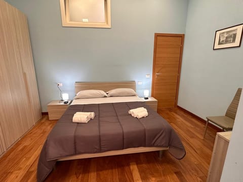 Bed, Photo of the whole room, Bedroom, towels, wardrobe