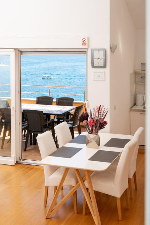 Natural landscape, Living room, Seating area, Dining area, Sea view