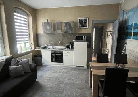 Kitchen or kitchenette, Living room, Seating area, Dining area, toaster