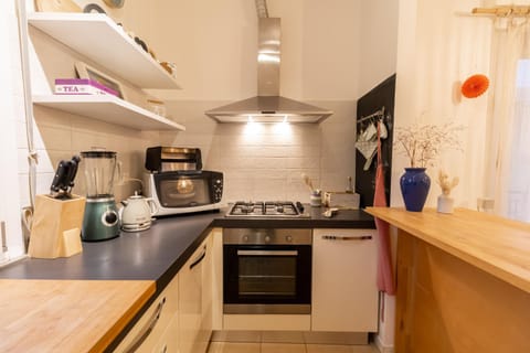 Kitchen or kitchenette, stove