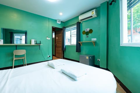 Bed, Photo of the whole room, Bedroom, towels, air conditioner