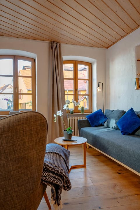 Bed, Living room, Seating area, Bedroom