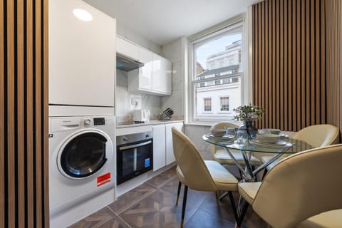 Seating area, Dining area, oven, stove, washing machine