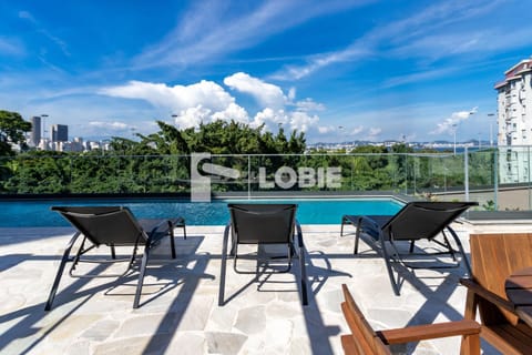 Property building, Day, View (from property/room), Pool view, Swimming pool, sunbed